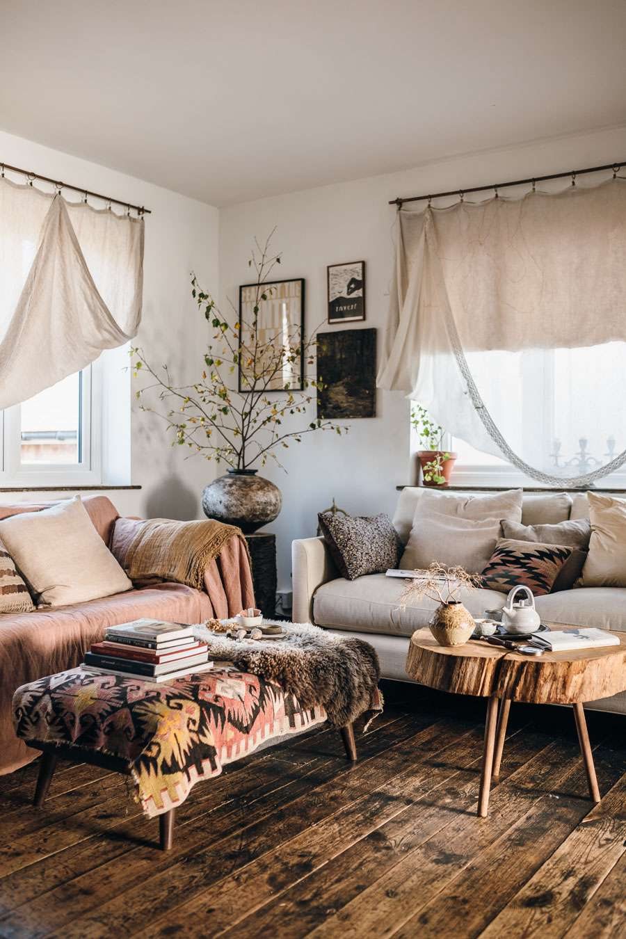 Styled living room with warm textures and timber flooring